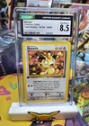The Pokémon Company Meowth Team Rocket 1st Edition 62/82 CGC 8.5 Pokémon Card