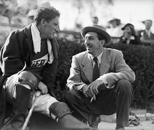Los Angeles CA Spencer Tracy a player talks to Walt Disney between- Old Photo