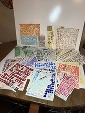 Crop In Style Binder Filled With Alphabet Stickers. Various Fonts, Sizes, Colors