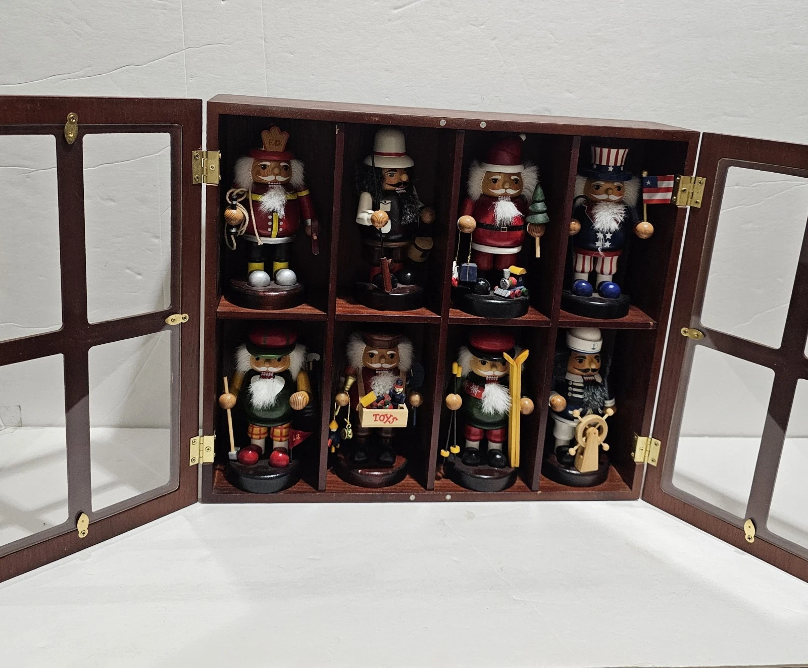 Set of 8 Christmas Nutcrackers & Wood Case Display With Glass Doors 15x13x4
Opens in a new window or