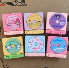Hello Kitty CD player with attached CD Shoe Charms x 6
