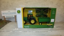 Ertl Britains 15489 in 1:32, John Deere 6410 set con rimorchio e scavatore, NUOVO