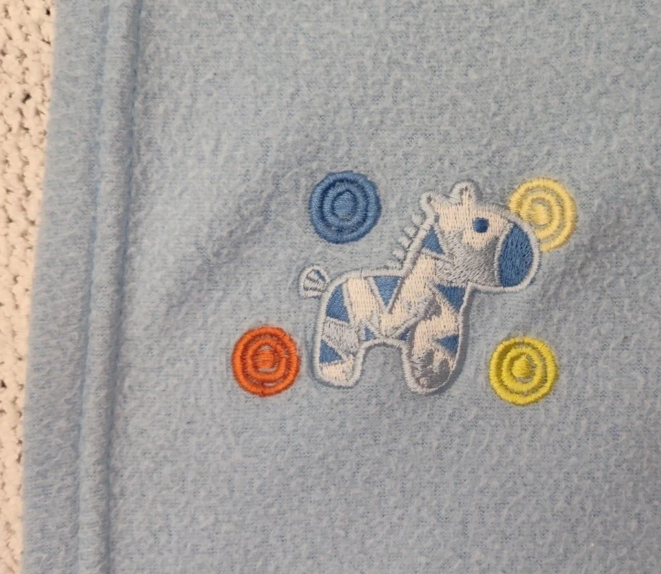 Manta polar Fisher Price azul cebra bebé niño usado círculos difícil de encontrar Lovey Foto 2 de 4