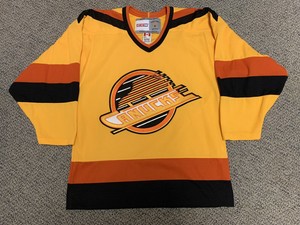 canucks yellow skate jersey