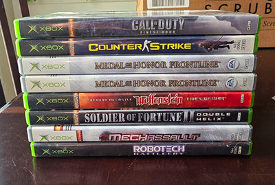 Microsoft Xbox NTSC Shooter Game Lot w/ Cases - COD, Medal of Honor, Wolfenstein