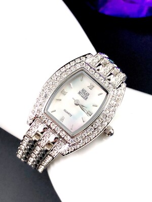 DAZZLING NOLAN MILLER GOLD-TONE FINISH CRYSTAL