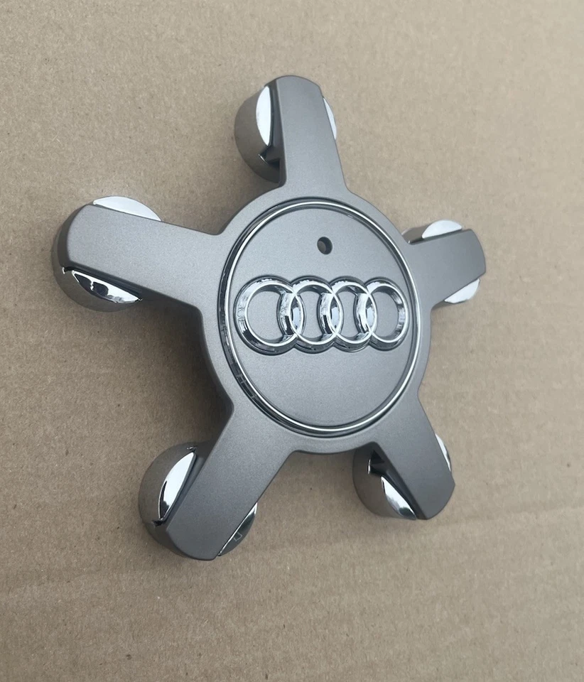 Audi A4 A5 S4 S5 Q5 2015 09-16 llanta central tapacubos emblema original gris OEM Foto 2 de 4