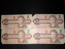Lot of 4 CANADIAN 1986 2 DOLLAR BILLs (CIRCULATED)