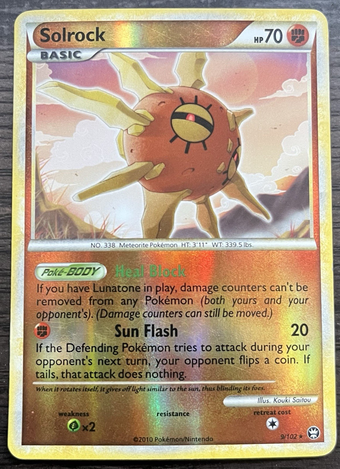 Solrock 9/102 Pokemon TCG Triumphant Reverse Holo Lightly Played LP
