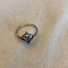 Delicate purple and silver tone ring