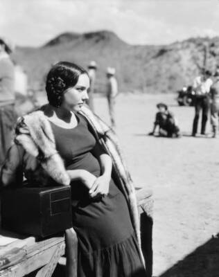Mexican actress Lupe Velez waits for her next scene on the set of - Old Photo
