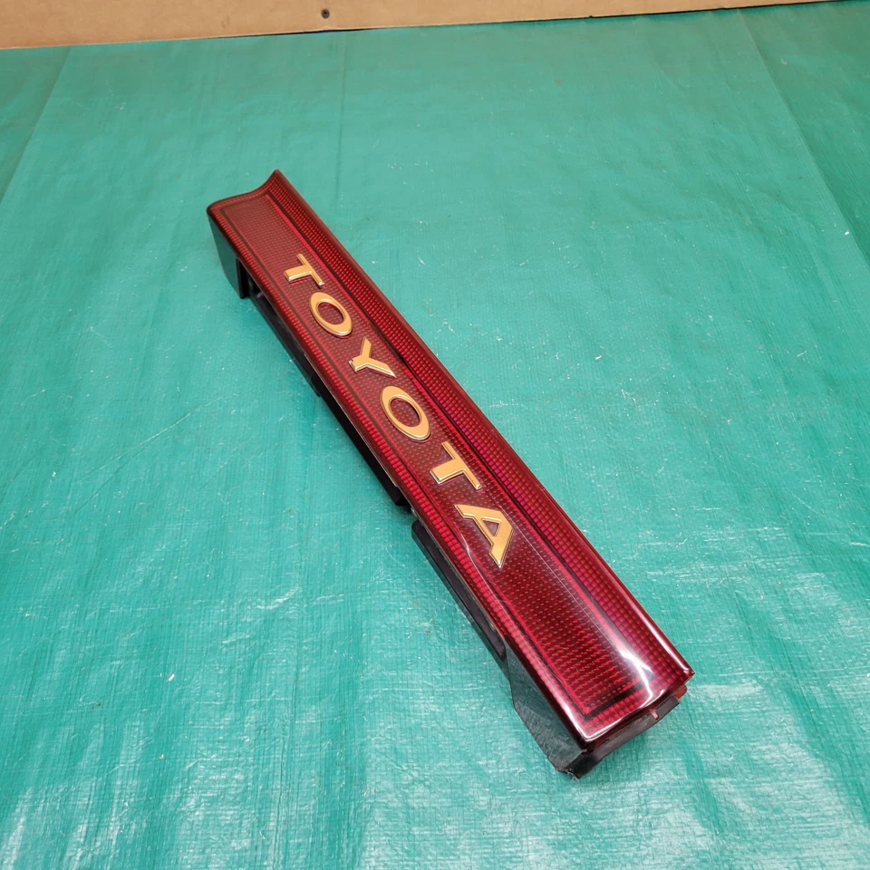 Toyota Previa 1991-1997 puerta levadiza manija moldura placa placa luces OEM 81276-28010 Foto 3 de 4