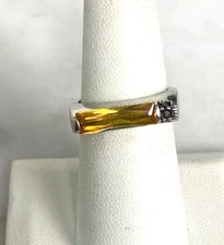 925 STERLING SILVER AND YELLOW GEM RING SIZE 7