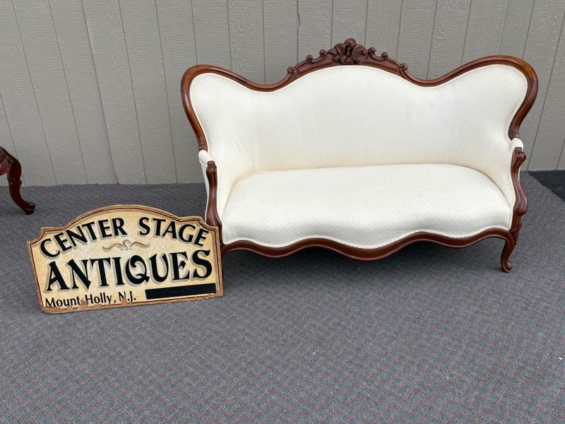 67764 Victorian Carved Walnut Sofa with Cream Upholstery