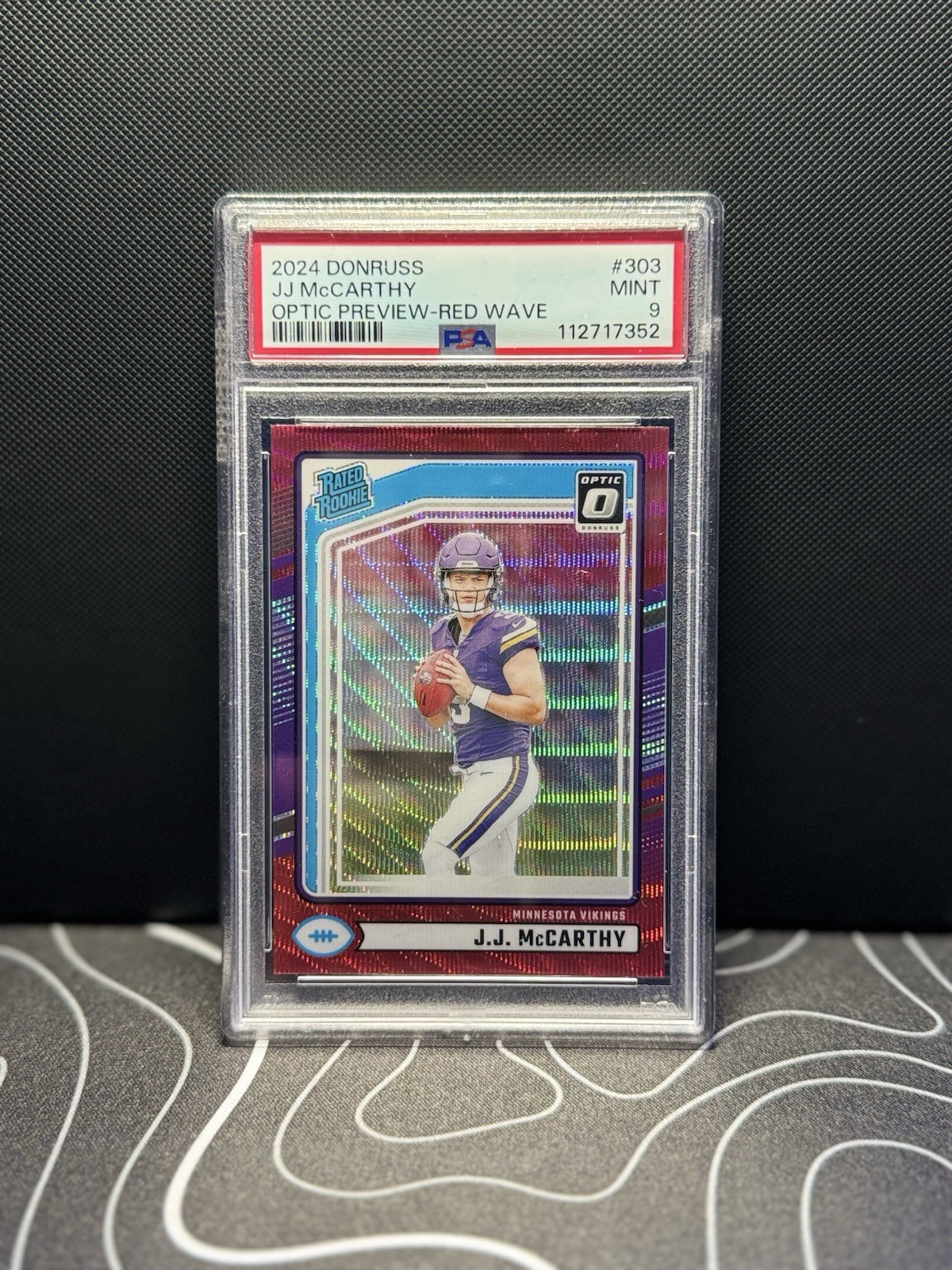 2024 Panini Donruss - J.J. McCarthy #303 Optic Preview Red Wave Prizm (RC)