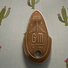 VINTAGE 1956 GENERAL MOTORS MOTORAMA ADVERTISEMENT TOKENS GM keychain 