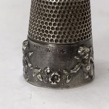 Antique Simons Bros. Cupid Sterling Silver Thimble Cherubs & Flowers Size 9 Antique Simons Bros. Cupid Sterling Silver Thimble Cherubs & Flowers Size 9 - Image 1