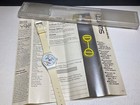 VINTAGE SWATCH WATCH (NON-WORKING) W/ CASE, PAPER INSERT & YELLOW SWATCH GUARD