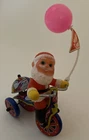 Vintage Christmas Santa Tin Toy On Tricycle W/ Sign & Balloon 1950's