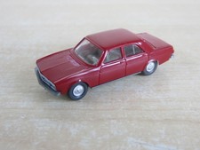 Red Audi 100 Wiking model car, 1 : 87 Scale.