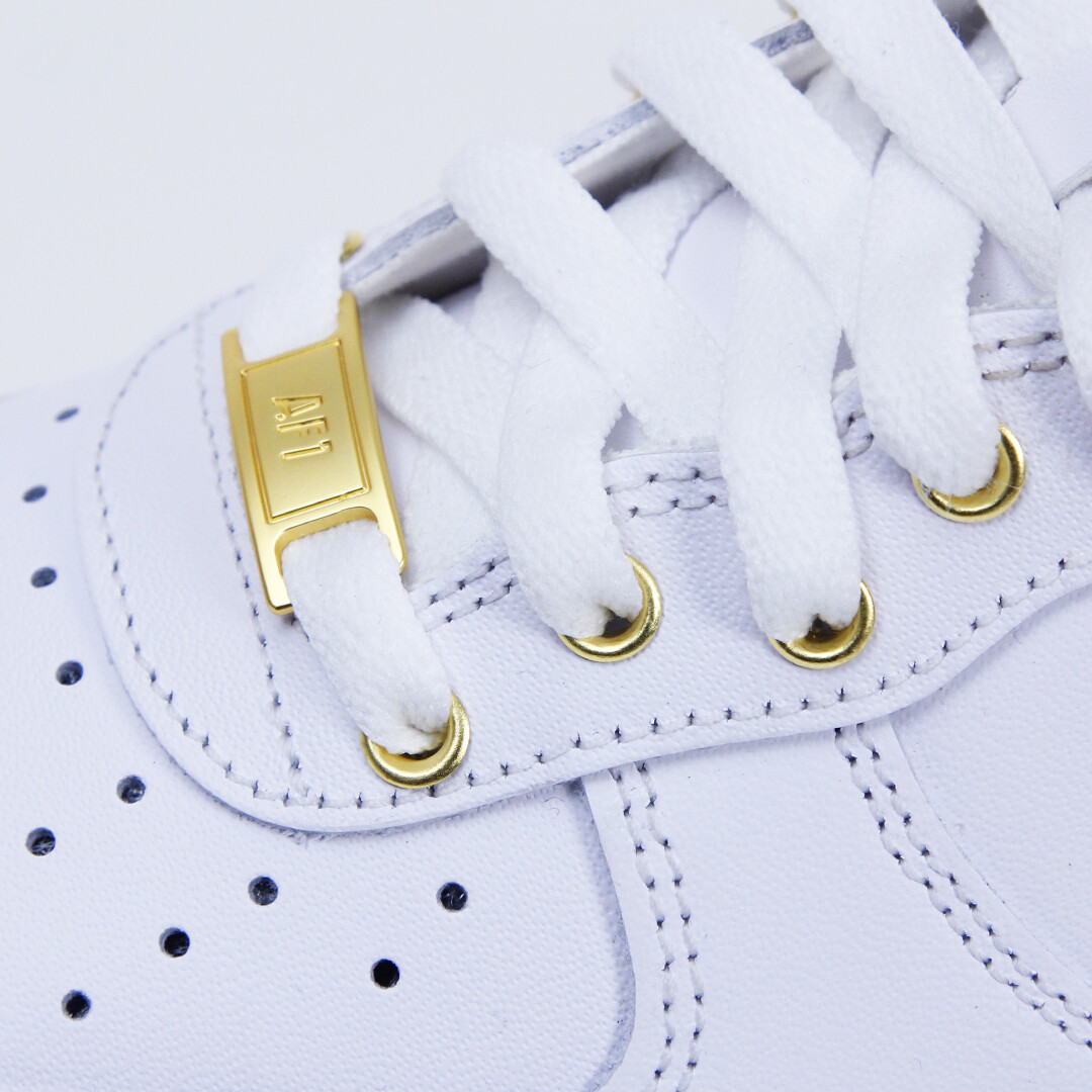 white and metallic gold air force 1