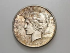 1923-S $1 PEACE SILVER ONE DOLLAR BU TONED