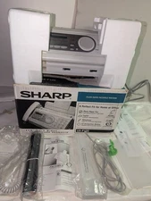 NEW Sharp UX-P100 Plain Paper Personal Fax Machine Copier Phone Caller ID