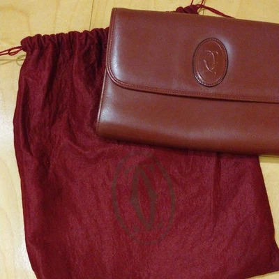 Sac pochette à rabat en cuir Cartier Must Line logo en relief authentique bor... - Photo 1/4