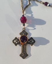 Brass Colored Cross Necklace With Red Rhinstones.
