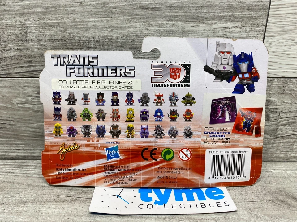 Paquete de 3 mini estatuillas MEGATRON Transformers + pieza de rompecabezas 3D 30 aniversario Goldie Foto 2 de 2