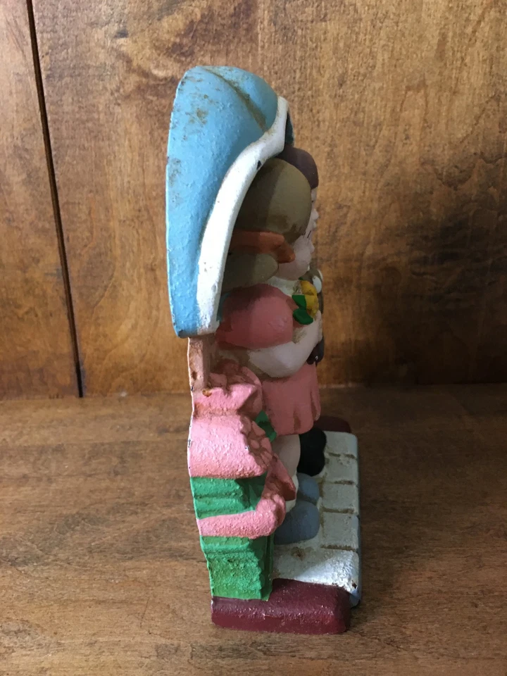 Tope de puerta vintage 1993 W.A hierro fundido niño y niña flores y paraguas 7" raro Foto 2 de 4