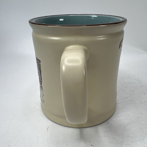 Spectrum Designz Coffee Mug/Cup Catching a fish beige and blue - Picture 2 of 9