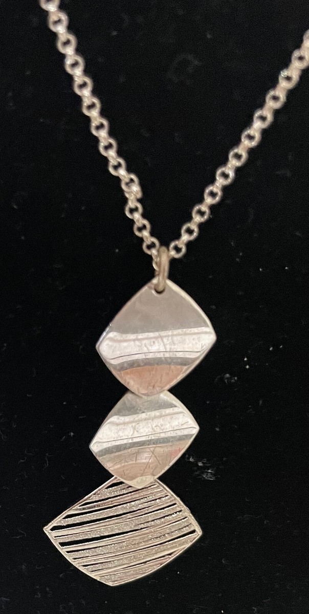 pendente a forma di mela che si divide in due ciondolini - Jewels | Produzione Gioielleria in Argento 925 | Made in Italy