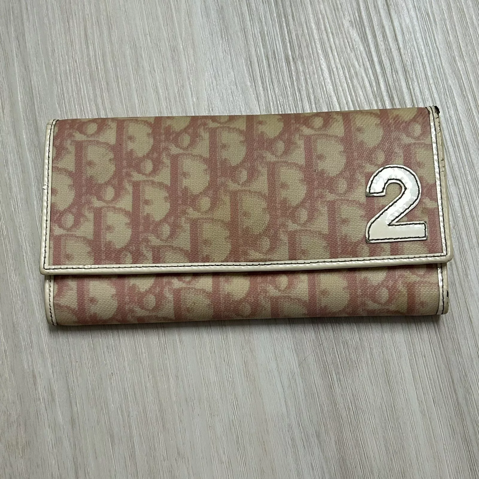 Portefeuille Christian Dior rose trott deux volets monogramme signature vintage