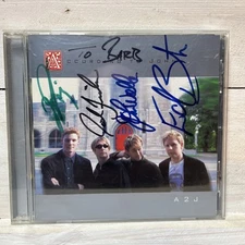 A2J - Music CD According to John 1999-05-04 - KMG Records signed 