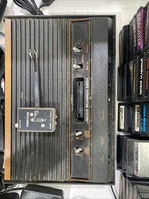 Atari CX-2600 Console With 3 Joysticks 2 Paddles AC Plug And 41 Games