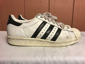 white and navy shell toe adidas