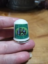Vintage Schuster's root beer advertising ceramic thimble.