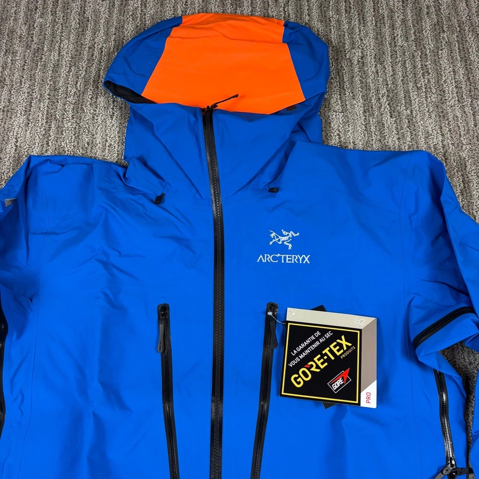 NUEVA Chaqueta Arc'teryx Alpine Guide Gore-Tex Pro Para Hombre M Azul Naranja Concha para Nieve Foto 3 de 4