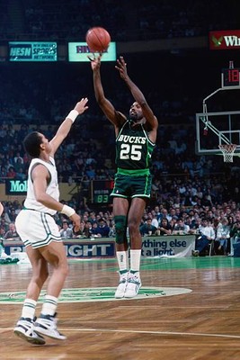Paul Pressey Milwaukee Bucks shoots a jump shot a over Dennis John- Old Photo