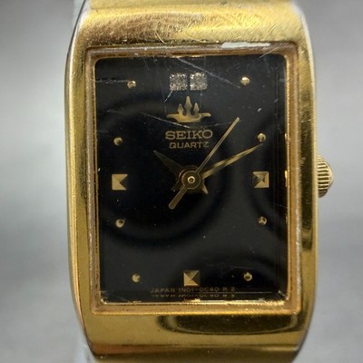 Seiko Tank Watch Women 16mm Black Dial Gold Tone Rectangle 1N01