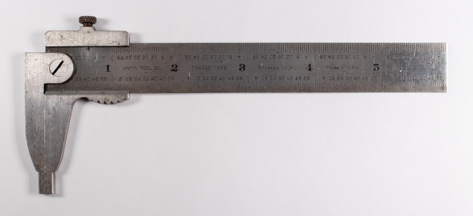 A 6-inch machinist slide caliper from Union Tool Co., Massachusetts — a beautiful piece of American industrial heritage that doubles as a desk curiosity.