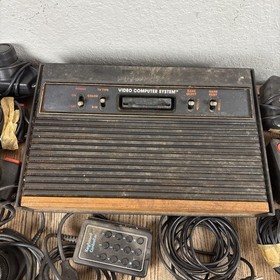 Atari 2600 Game Console W/ Controls & 20 Games w/ paddles & joysticks Untested