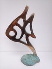 Bronze sculpture , signed by the artist , new .