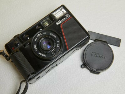 NIKON L35AF 35mm film camera with flash case and caps - working