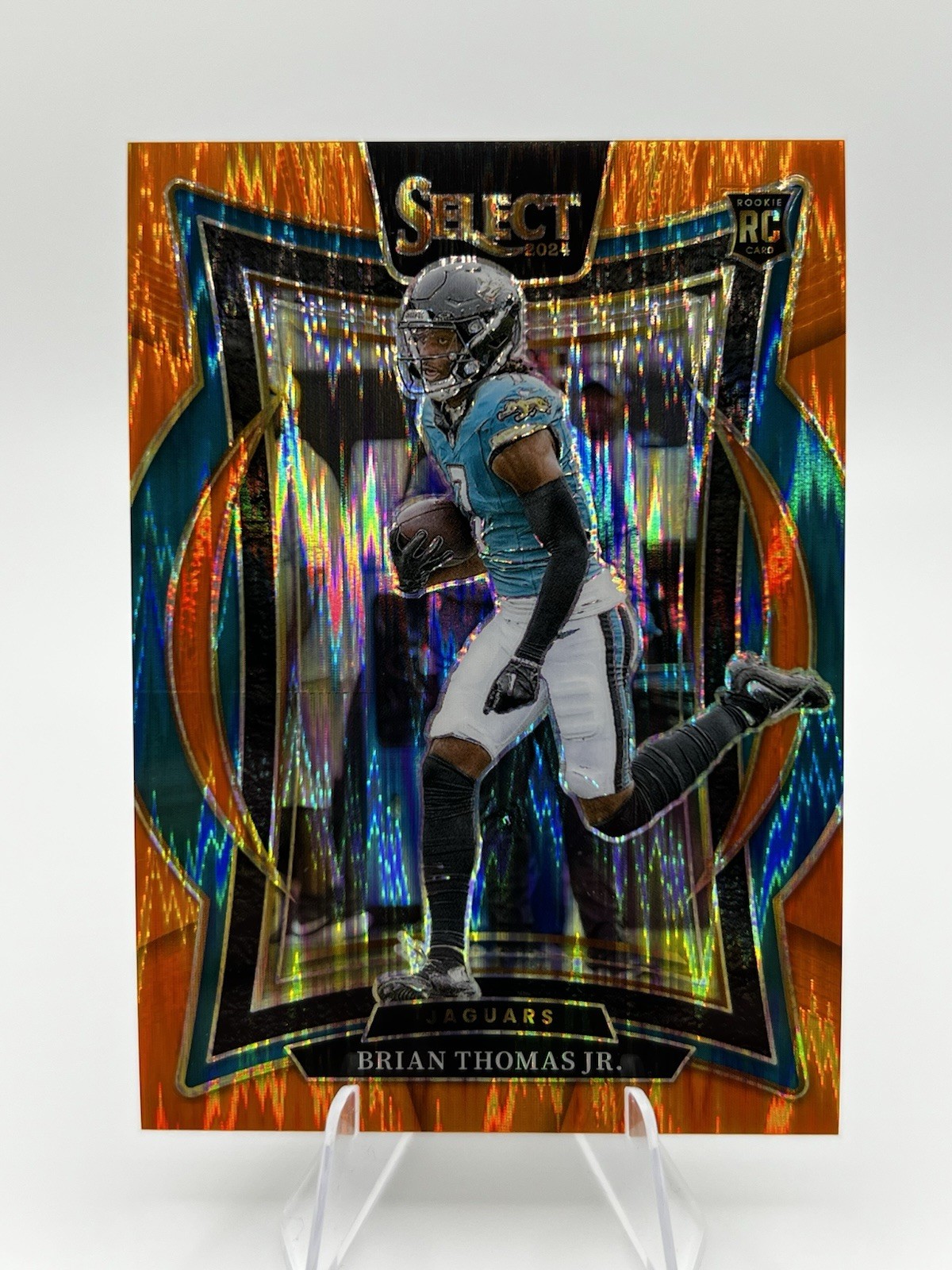 2024 Panini Select -  Brian Thomas Jr. #91 Orange Shock Prizm /499 (RC)