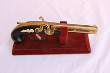 Briquet en forme d'ancien pistolet