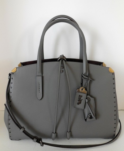 coach cooper carryall with rivets
