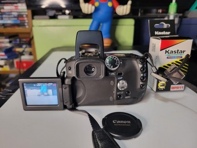 Canon PowerShot Pro 1 8.0MP Digital Camera PC1057 NEWBATTERY CHARGER Tested Work