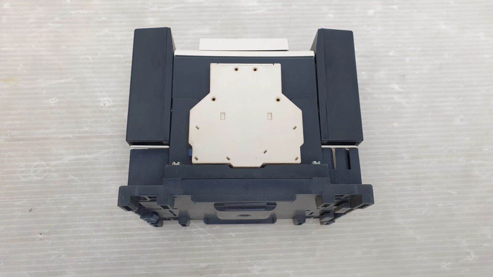 Top of the LC1D115 contactor with the auxiliary contact block